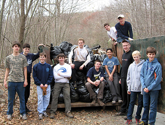 Scouts take a break during a cleanup of the Halfway River in spring of 2012. Eric Rasmussen, who coordinated his effort with Nutmeg TU, earned his Eagle Award for his work.