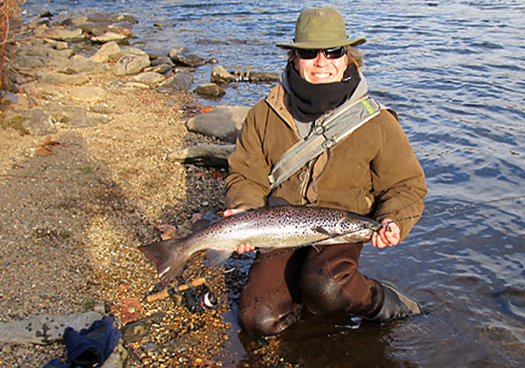 Ron Merly holds a 32-inch salmon caught below the Tingue Dam recently.