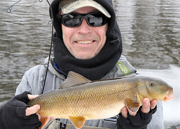 Ron Merly with a common sucker caught while salmon fishing on the Naugatuck River.