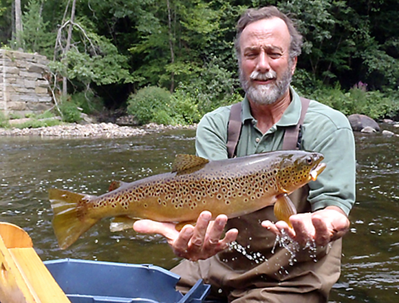 Mike Humphreys of the Department of Energy and Environmental Protection with a 22-inch wild brown on the Shepaug