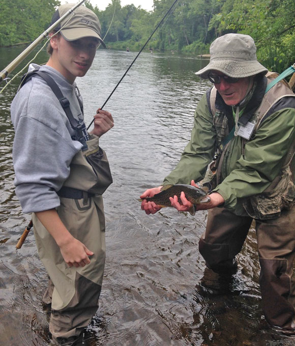 Josh Lockwood, grandson of Nutmeg TU member Phil Jacques, landed this fish, held by Nutmeg TU member Dave Edgeworth, who guided the recent trip to the Farmington.