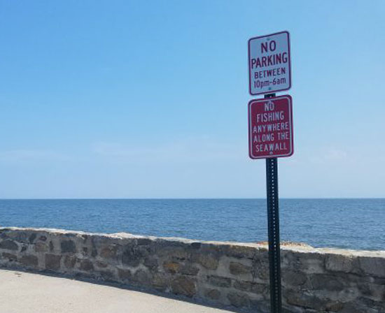 New signs indicate that fishing is forbidden on the Stratford Seawall. — Stratford Star photo