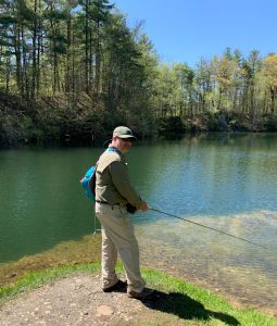 Alex Ziemkiewicz tests his skill in one of the ponds on the grounds of the Limestone Club in Canaan, CT.